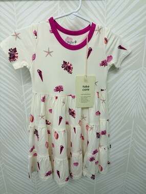 Kyte Baby Bamboo Short Sleeve Tiered Twirl Dress in Seashell Raspberry